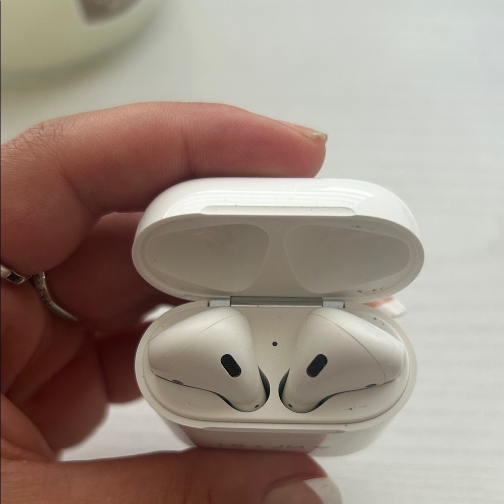 Apple AirPods and extra case